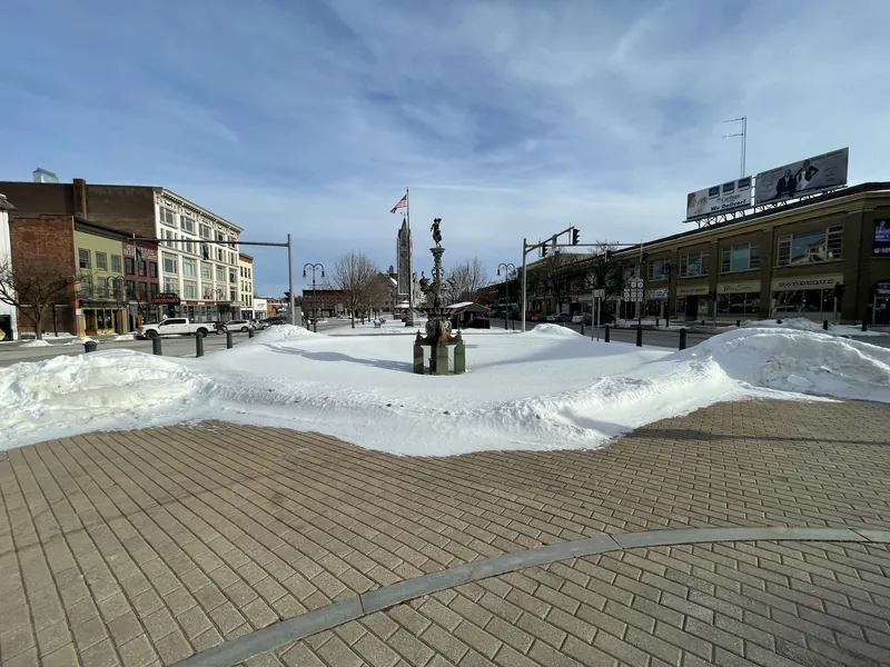 Snowbanks around the fountain in Watertown's Public Square in winter